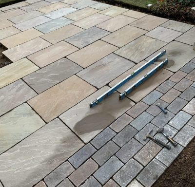 Natural stone patio during construction in Grassendale, Liverpool